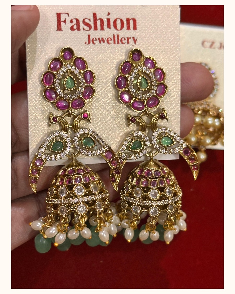 Pink and green peacock jhumka earrings